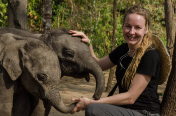 Professor Virpi Lummaa and the baby elephant twins in Myanmar